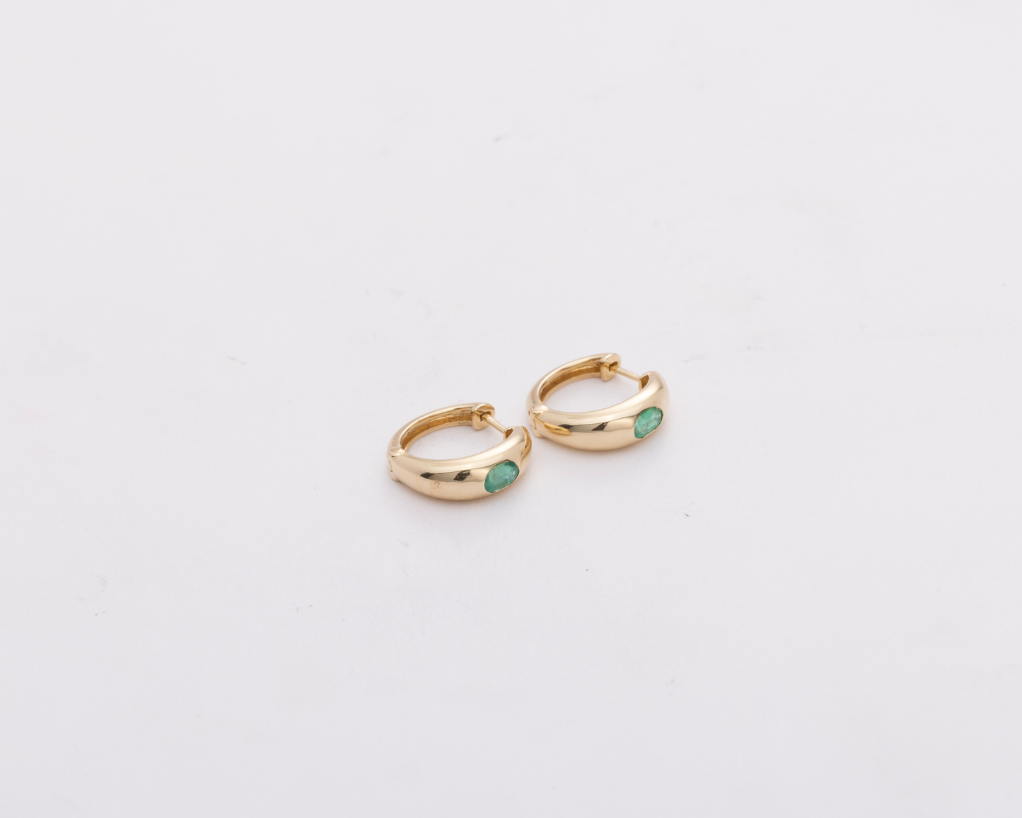 Gold & Emerald Huggie Earrings